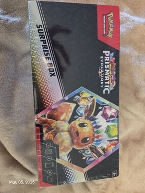 Pokemon Prismatic Evolutions Surprise Box - Black, Red, Rainbow